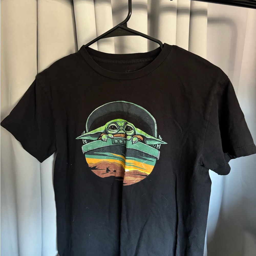 From Disney World.  Black T-Shirt with Green Graphic